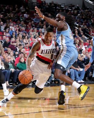 http_imgc.allpostersimages.comimagesP-473-488-90777757QOP3300Zposterssam-forencich-mar-1-2014-denver-nuggets-vs-portland-trail-blazers-damian-lillard