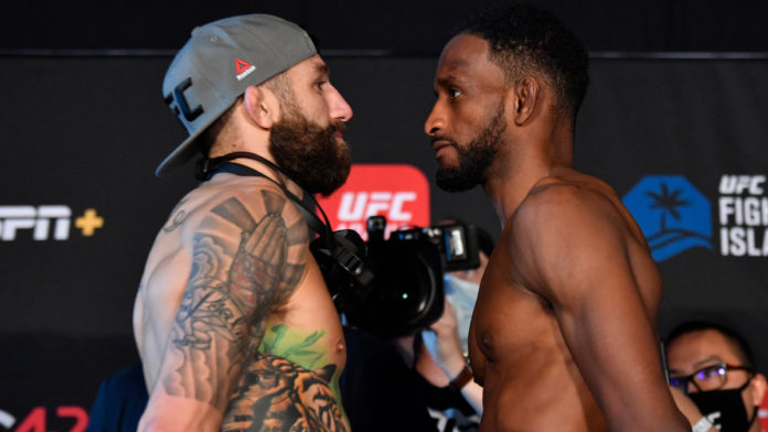 Neil Magny facving off with Michael Chiesa