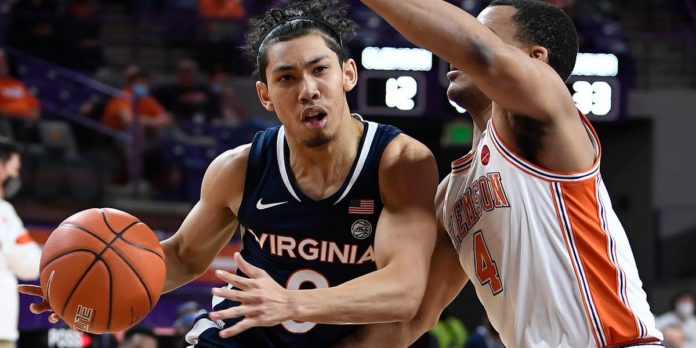 a UVA player driving to the basket.