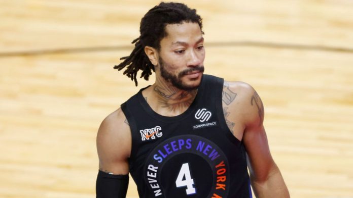 Derrick Rose, posing in his new NY Knicks jersey before a game.