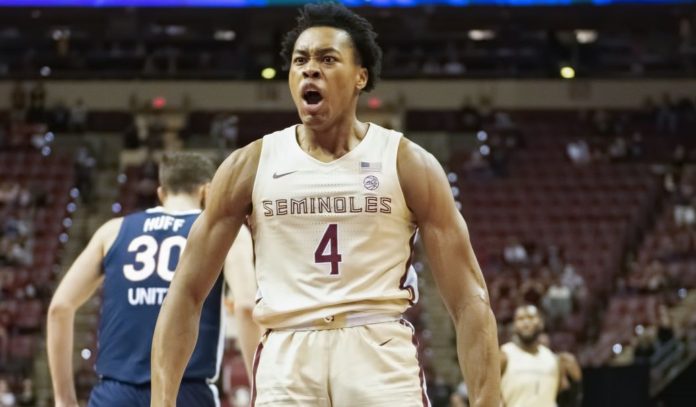 A Florida State basketball player pumped up after defeating top ranked UVA.