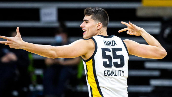 Iowa star Luka Garza celebrating a win.