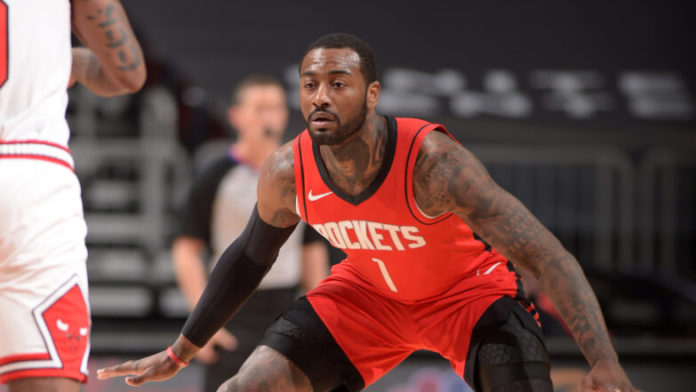 Rockets' star John Wall squaring up on defense.