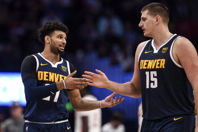 Nuggets' stars Jamal Murray and Nikola Jokic in a game.