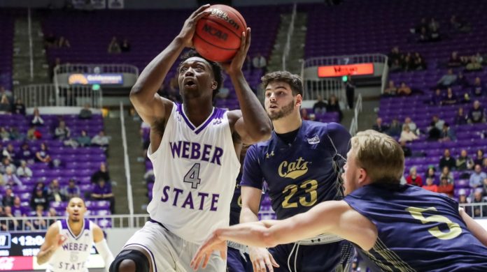 A Weber State player heading to the rim.