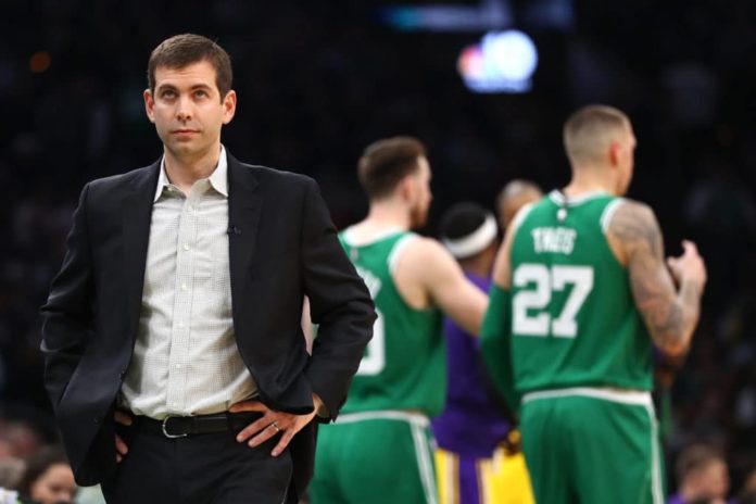 Celtics' coach Bradley Stevens looking disappointed on the sidelines.