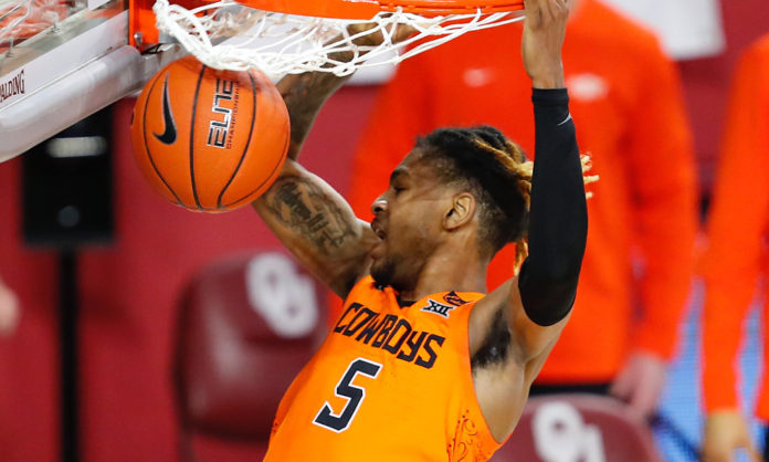 An Oklahoma State player with the slam-dunk.