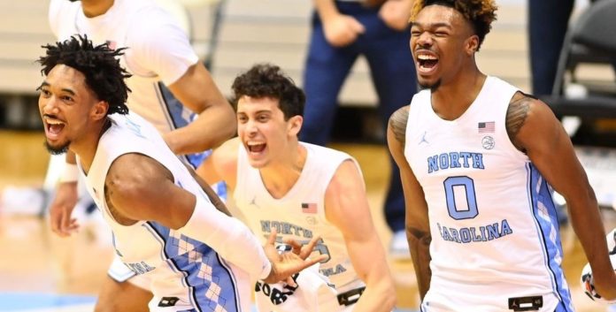 UNC players celebrating in their win against Virginia Tech.