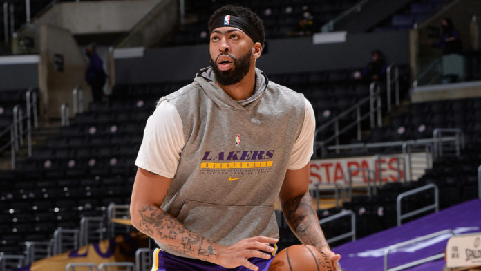 LOS ANGELES, CA - APRIL 15: Anthony Davis #3 of the Los Angeles Lakers warms up before the game against the Boston Celtics on April 15, 2021 at STAPLES Center in Los Angeles, California. NOTE TO USER: User expressly acknowledges and agrees that, by downloading and/or using this Photograph, user is consenting to the terms and conditions of the Getty Images License Agreement. Mandatory Copyright Notice: Copyright 2021 NBAE (Photo by Andrew D. Bernstein/NBAE via Getty Images)