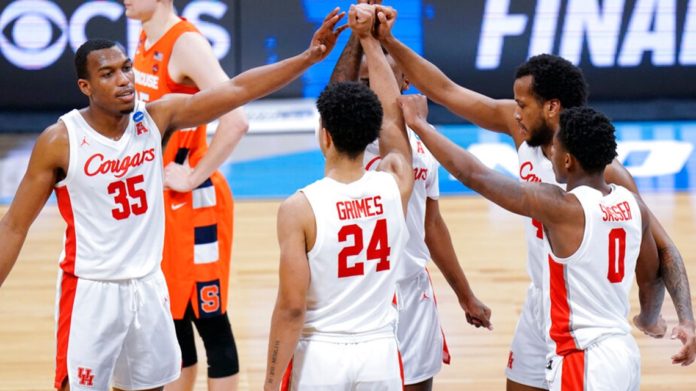 Houston Cougars basketball team coming together before going into the game.