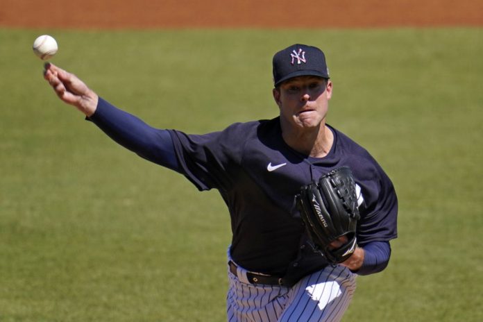 The struggling Corey Kluber, warming up for his NYY.