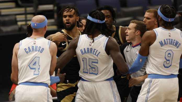 Apr 6, 2021; Tampa, Florida, USA; Los Angeles Lakers center Montrezl Harrell (15) gets ejected Toronto Raptors forward OG Anunoby (3) during the first quarter at Amalie Arena. Mandatory Credit: Kim Klement-USA TODAY Sports