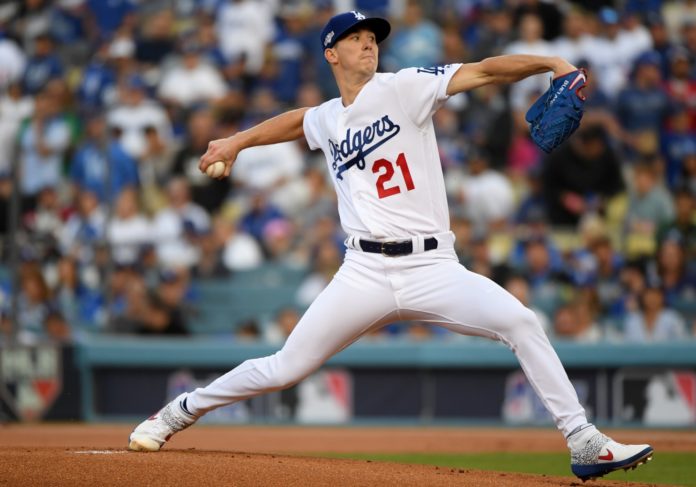 Walker Buehler pitching at the mound.