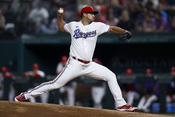 Rangers' Dane Dunning at the mound.