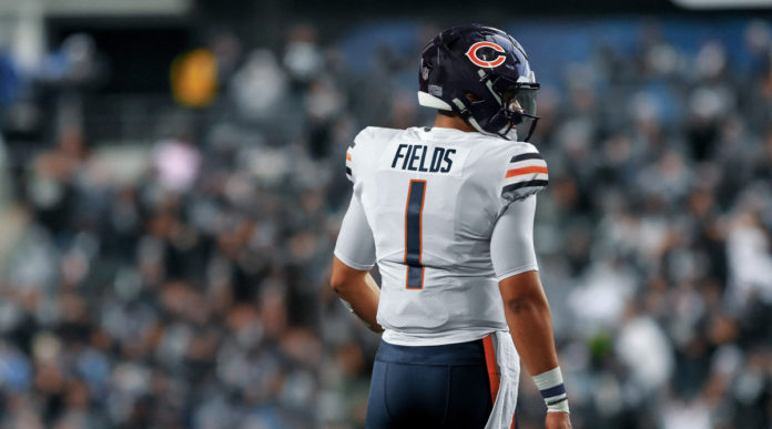 Chicago Bears #1 draft pick, Justin Fields, already donning a Bears jersey.