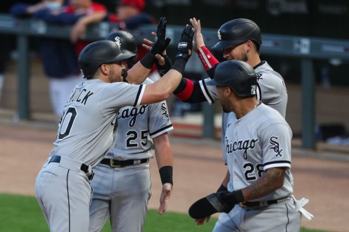 White Sox hitters celebrating after a big hit.