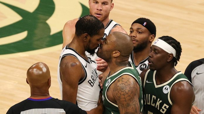 Kevin Durant and PJ Tucker getting in a skirmish in game four of the playoffs.