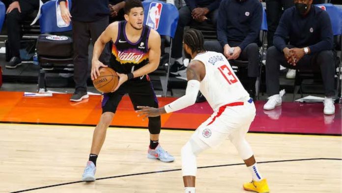 Paul George vs. Devin Booker in game 1 of the Western Conference Finals.