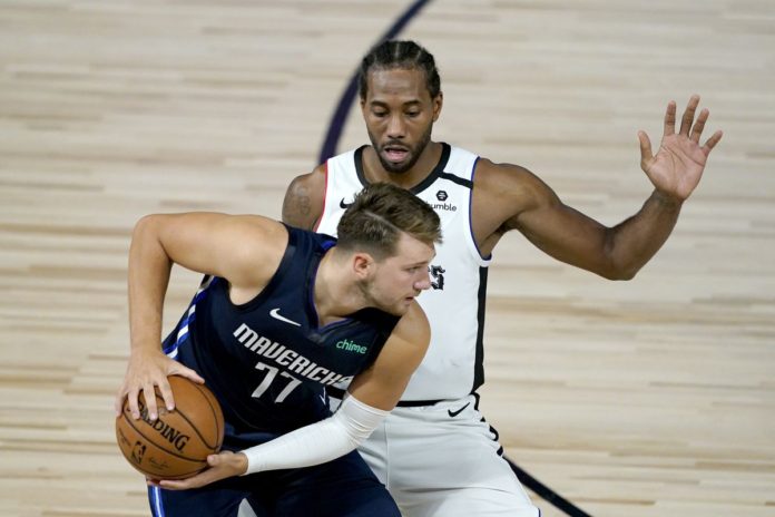 Luka Doncic facing off with Kawhi Leonard in the playoffs.