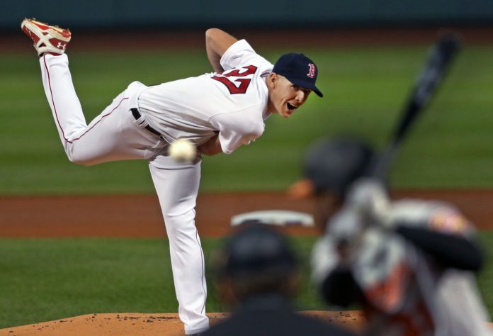 Nick Pivetta blasting a pitch on the mound.