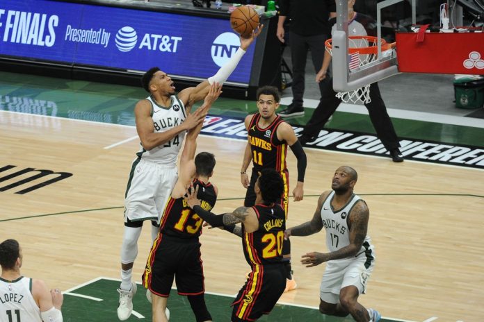 Hawks vs. Bucks in the East Finals as players battle on the hardwood.