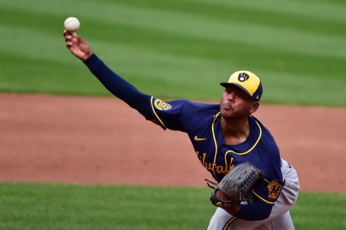 Milwaukee's ace Freddy Peralta on the mound.