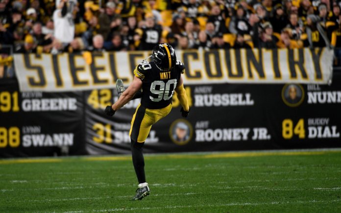 TJ Watt celebrating on the Steelers home field.