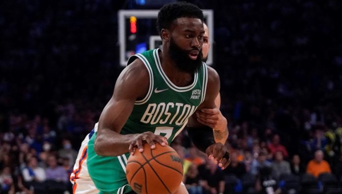 Jaylen Brown, the Celtics shooting guard, dribbling down the court.