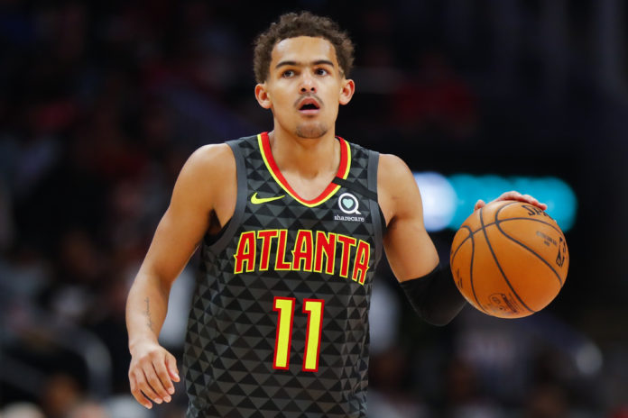 ATLANTA, GA - FEBRUARY 29: Trae Young #11 of the Atlanta Hawks controls the ball during the second half of an NBA game against the Portland Trail Blazers at State Farm Arena on February 29, 2020 in Atlanta, Georgia. NOTE TO USER: User expressly acknowledges and agrees that, by downloading and/or using this photograph, user is consenting to the terms and conditions of the Getty Images License Agreement. (Photo by Todd Kirkland/Getty Images)