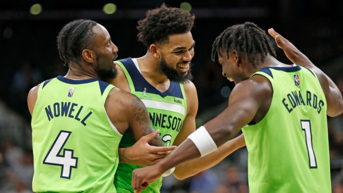 Karl Anthony-Towns, celebrating after a 60 pt game.