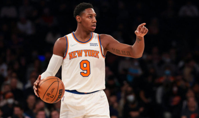 Jan 6, 2022; New York, New York, USA; New York Knicks guard RJ Barrett (9) dribbles up court against the Boston Celtics during the first quarter at Madison Square Garden. Mandatory Credit: Vincent Carchietta-USA TODAY Sports