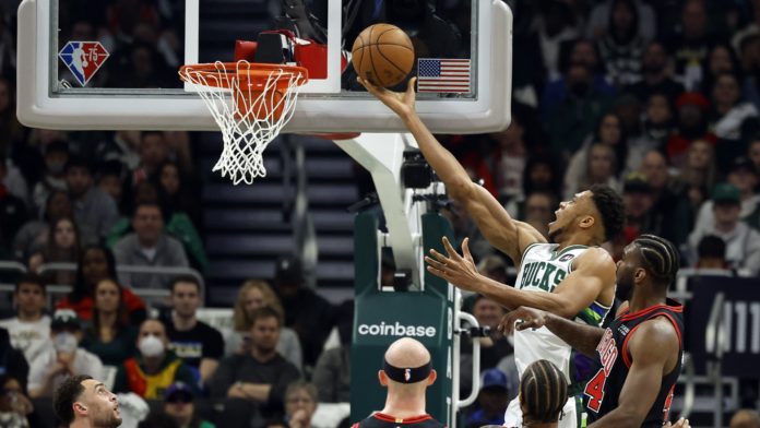 Apr 17, 2022; Milwaukee, Wisconsin, USA; Milwaukee Bucks forward Giannis Antetokounmpo (34) shoots during the first quarter against the Chicago Bulls during game one of the first round for the 2022 NBA playoffs at Fiserv Forum. Mandatory Credit: Jeff Hanisch-USA TODAY Sports