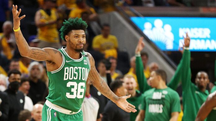 Marcus Smart, celebrating after another made 3-point shot in game 1 of the NBA Finals.